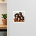 2x2 custom photo magnet featuring a happy Black family on a refrigerator